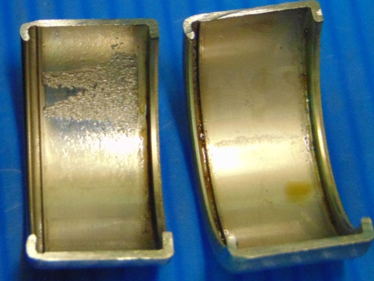 Wear of a bearing shell in a cutaway view.