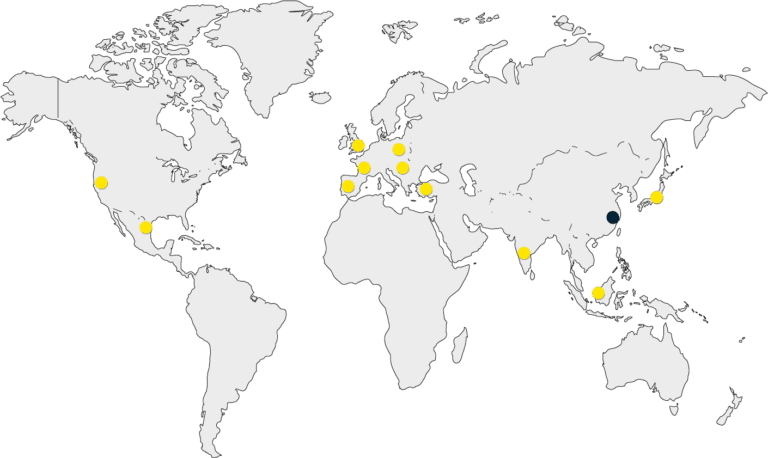 Eine Weltkarte mit gelben Punkten.